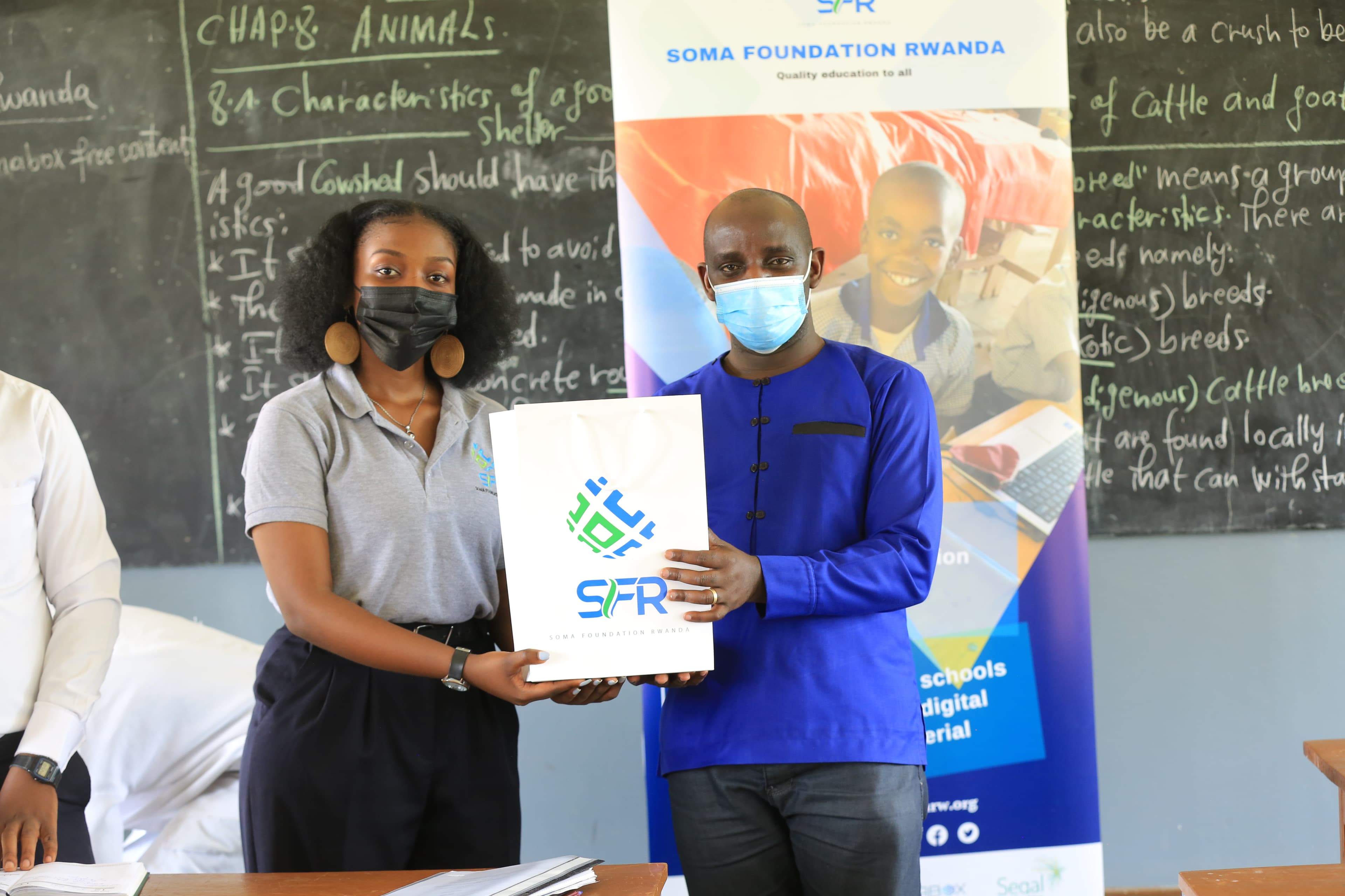 Soma Foundation Rwanda providing SomaBox to a school